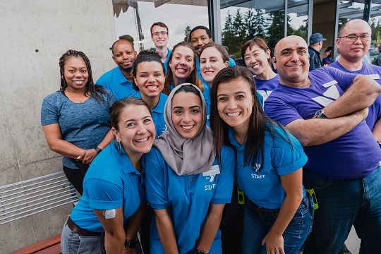 YMCA staff members pose for a group photo YMCA staff members pose for a group photo