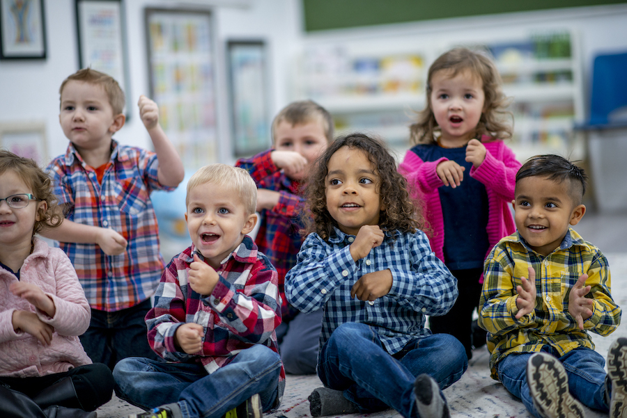 Kids playing together at YMCA child care program Kids playing together at YMCA child care program