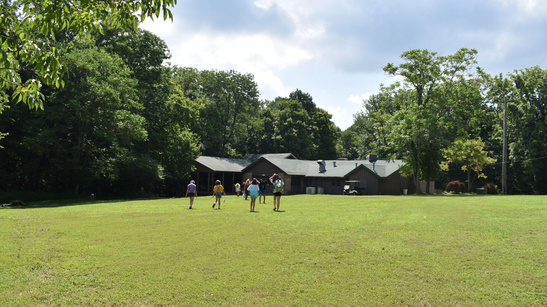 Campers walking towards a lodge at YMCA Camp Piomingo Campers walking towards a lodge at YMCA Camp Piomingo