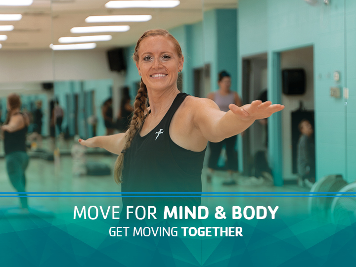 Woman in a mind body fitness class Woman in a mind body fitness class