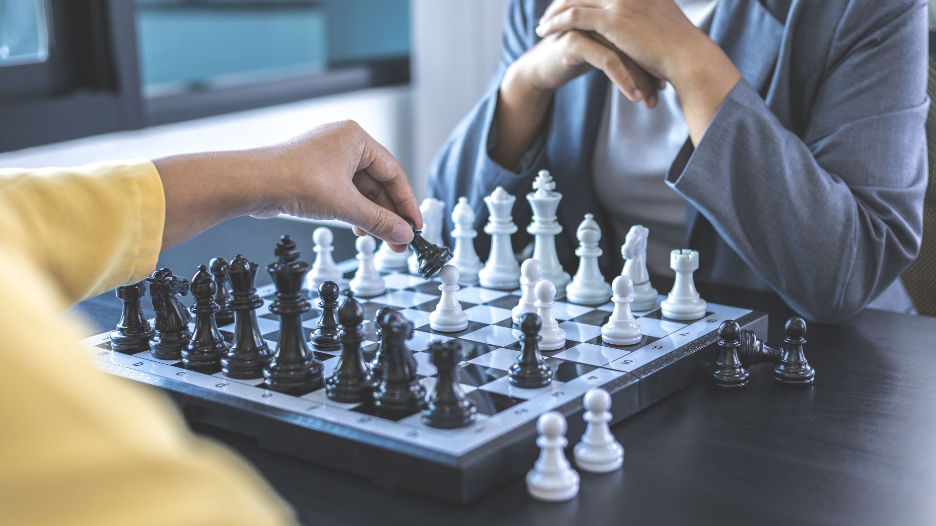 People playing chess People playing chess