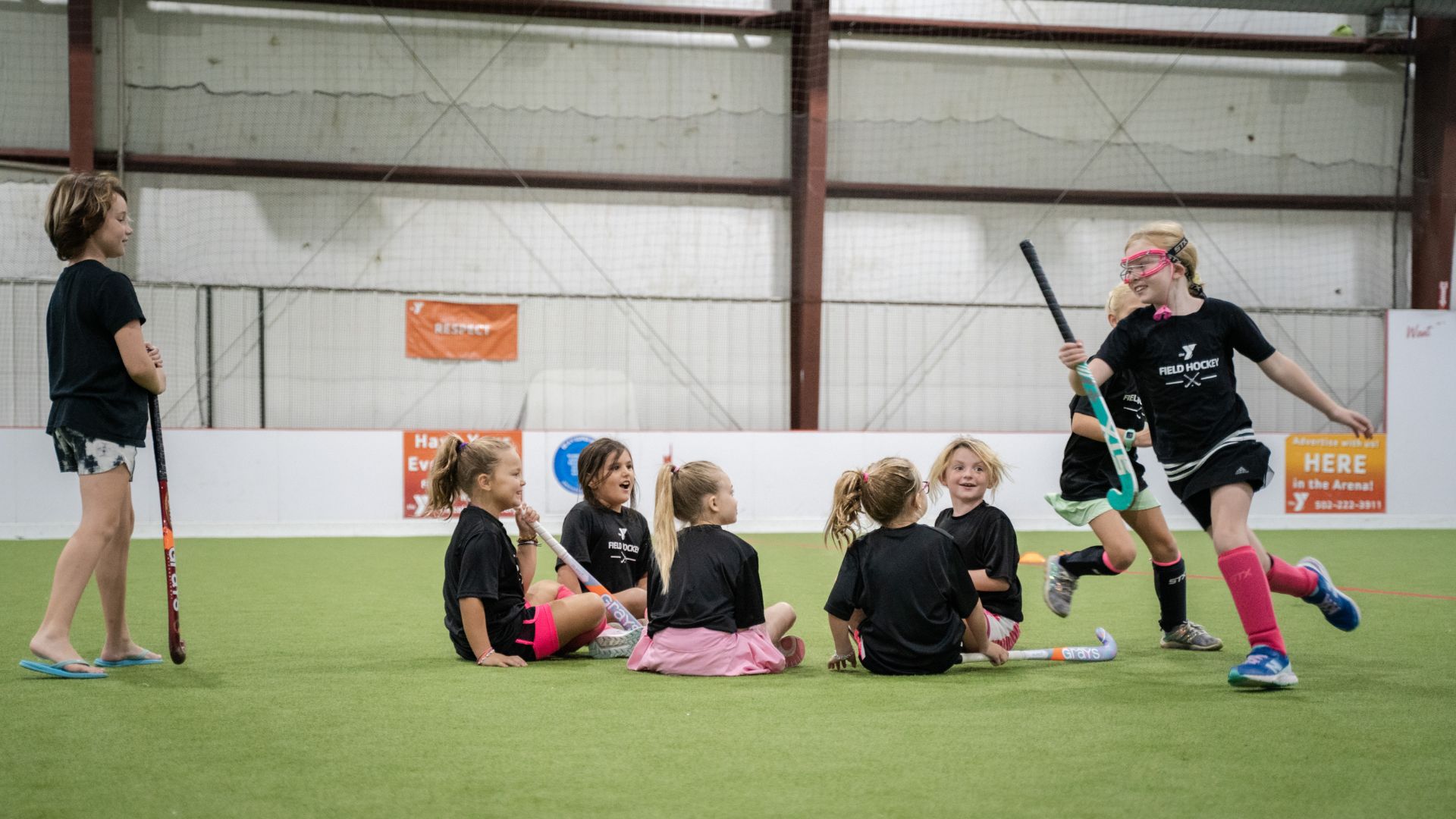 Kids learning how to play field hockey Kids learning how to play field hockey