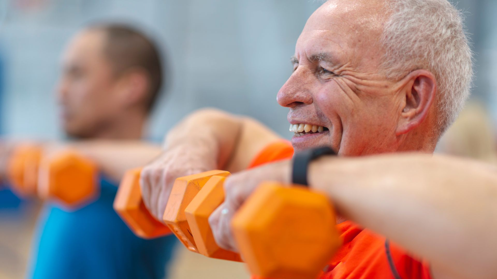 Men lifting hand weights Men lifting hand weights