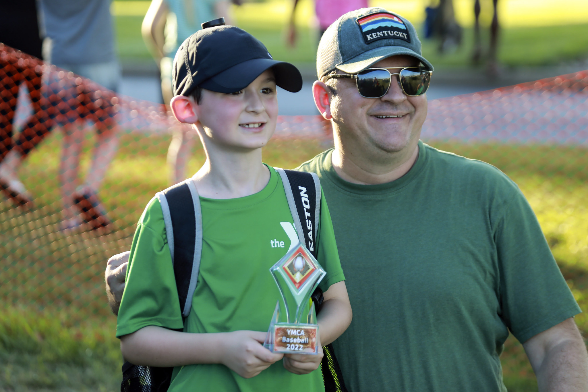 A dad and son volunteering at the Y A dad and son volunteering at the Y
