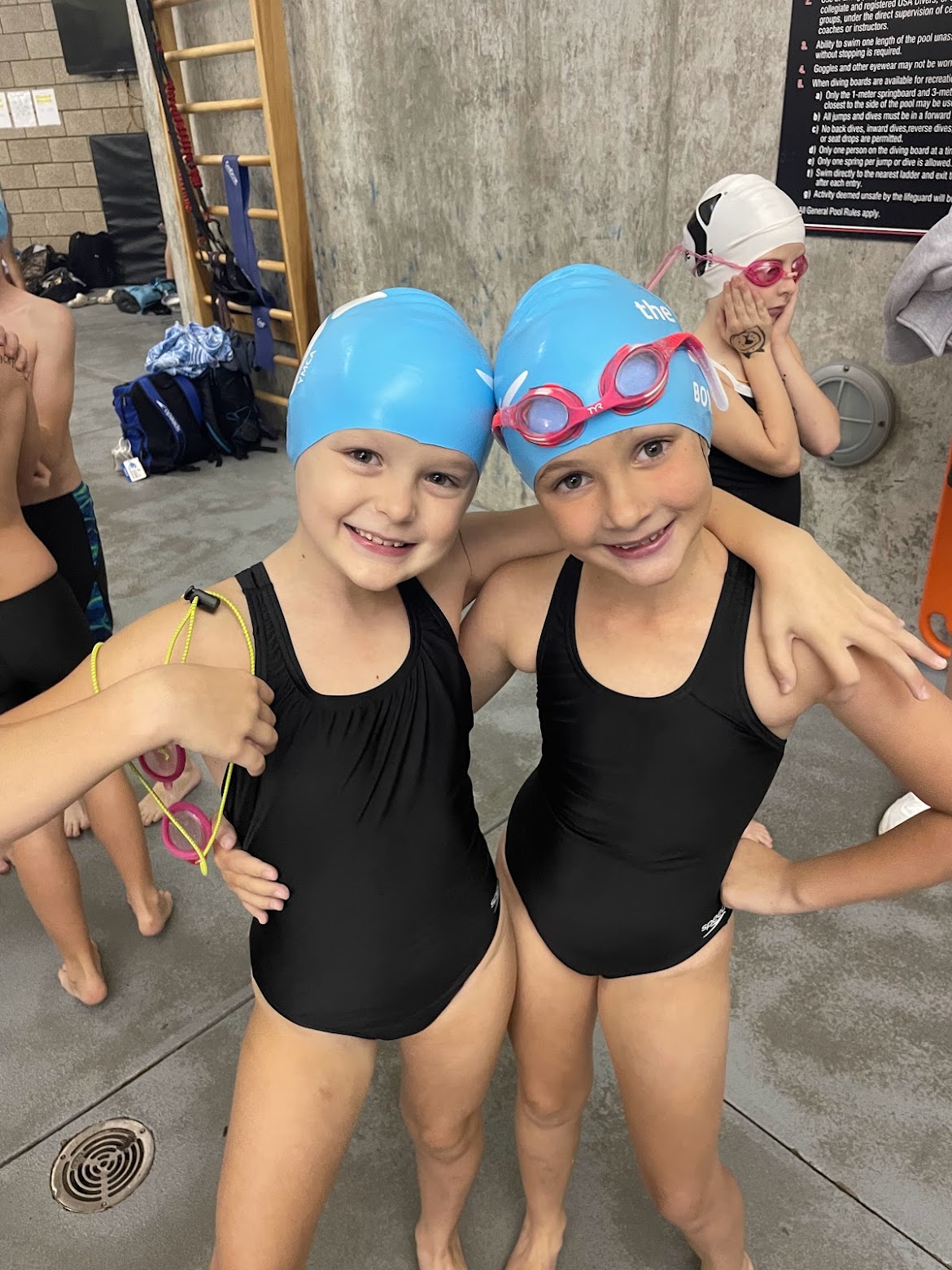 Two girls wearing swimsuits Two girls wearing swimsuits
