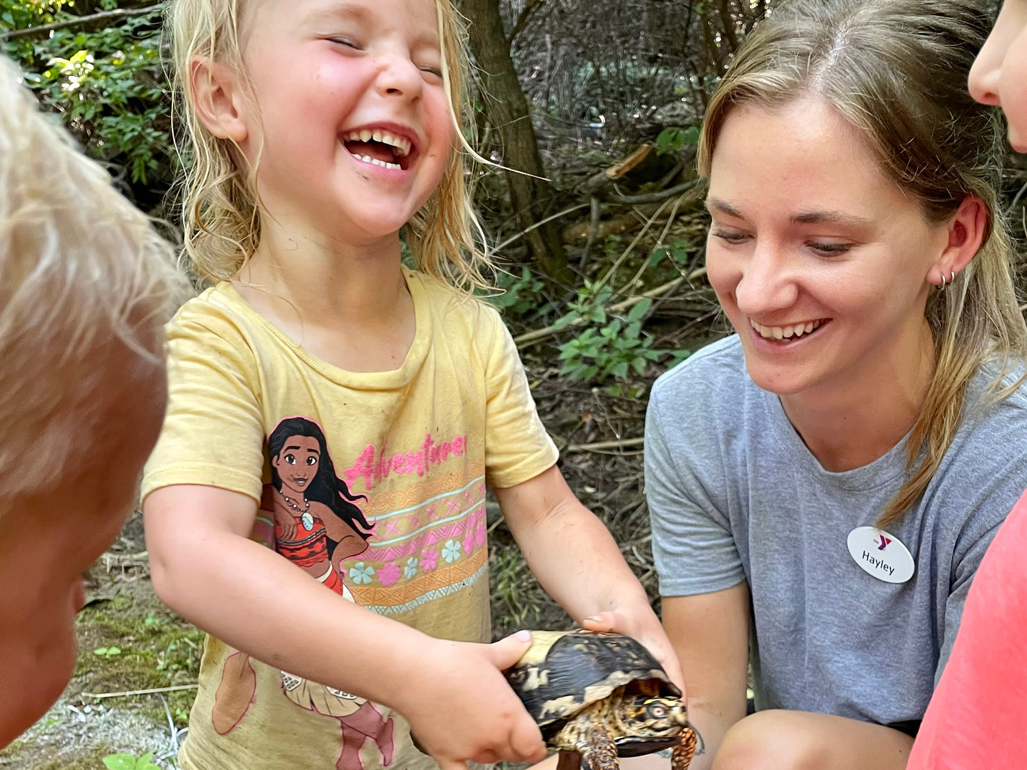 Girl holding a turtle Girl holding a turtle