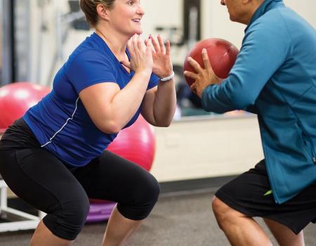 YMCA Louisville personal trainer coaching student YMCA Louisville personal trainer coaching student