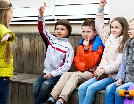Group of kids acting together Group of kids acting together