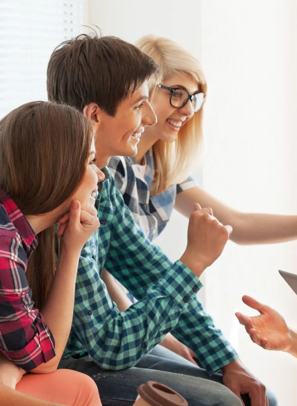 Group of teens supporting a group member after a presentation